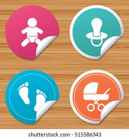 Round stickers or website banners. Baby infants icons. Toddler boy with diapers symbol. Buggy and dummy signs. pacifier and pram stroller. Child footprint step sign. Vector