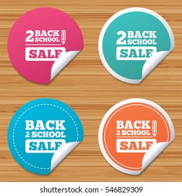 Round stickers or website banners. Back to school sale icons. Studies after the holidays signs. Pencil symbol. Circle badges with bended corner. Vector