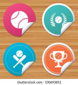 Round stickers or website banners. Baseball sport icons. Ball with glove and two crosswise bats signs. Winner award cup symbol. Circle badges with bended corner. Vector