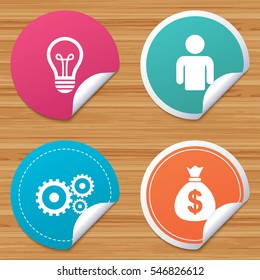 Round stickers or website banners. Business icons. Human silhouette and lamp bulb idea signs. Dollar money bag and gear symbols. Circle badges with bended corner. Vector