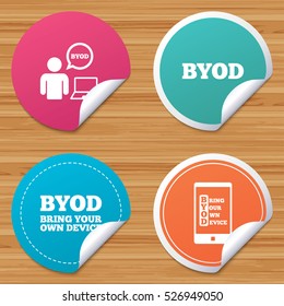 Round stickers or website banners. BYOD icons. Human with notebook and smartphone signs. Speech bubble symbol. Circle badges with bended corner. Vector