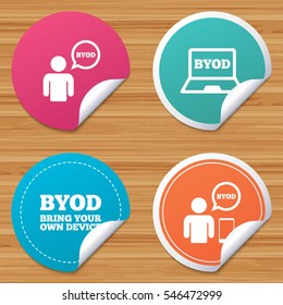 Round stickers or website banners. BYOD icons. Human with notebook and smartphone signs. Speech bubble symbol. Circle badges with bended corner. Vector