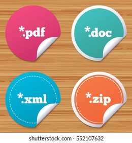 Round stickers or website banners. Document icons. File extensions symbols. PDF, ZIP zipped, XML and DOC signs. Circle badges with bended corner. Vector