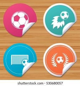 Round stickers or website banners. Football icons. Soccer ball sport sign. Goalkeeper gate symbol. Winner award laurel wreath. Goalscorer fireball. Circle badges with bended corner. Vector