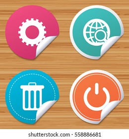 Round stickers or website banners. Globe magnifier glass and cogwheel gear icons. Recycle bin delete and power sign symbols. Circle badges with bended corner. Vector
