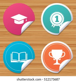 Round stickers or website banners. Graduation icons. Graduation student cap sign. Education book symbol. First place award. Winners cup. Circle badges with bended corner. Vector