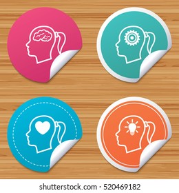 Round stickers or website banners. Head with brain and idea lamp bulb icons. Female woman think symbols. Cogwheel gears signs. Love heart. Circle badges with bended corner. Vector