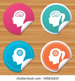 Round stickers or website banners. Head with brain icon. Male and female human think symbols. Cogwheel gears signs. Woman with pigtail. Circle badges with bended corner. Vector