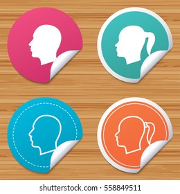 Round stickers or website banners. Head icons. Male and female human symbols. Woman with pigtail signs. Circle badges with bended corner. Vector