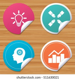 Round stickers or website banners. Lamp idea and head with gear icons. Graph chart diagram sign. Teamwork symbol. Circle badges with bended corner. Vector