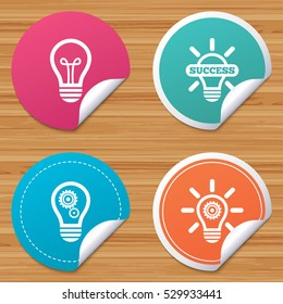 Round stickers or website banners. Light lamp icons. Lamp bulb with cogwheel gear symbols. Idea and success sign. Circle badges with bended corner. Vector