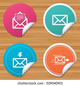 Round stickers or website banners. Mail envelope icons. Message document delivery symbol. Post office letter signs. Inbox and outbox message icons. Circle badges with bended corner. Vector