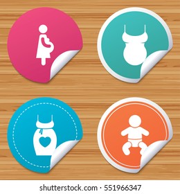 Round stickers or website banners. Maternity icons. Baby infant, pregnancy and shirt signs. Dress with heart symbol. Circle badges with bended corner. Vector