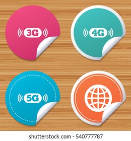 Round stickers or website banners. Mobile telecommunications icons. 3G, 4G and 5G technology symbols. World globe sign. Circle badges with bended corner. Vector
