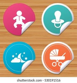 Round stickers or website banners. Moon and stars symbol. Baby infants icon. Buggy and dummy signs. Child pacifier and pram stroller. Circle badges with bended corner. Vector