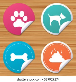 Round stickers or website banners. Pets icons. Dog paw and feces signs. Clean up after pets. Pets food. Circle badges with bended corner. Vector