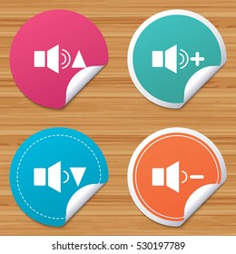 Round stickers or website banners. Player control icons. Sound louder and quieter signs. Dynamic symbol. Circle badges with bended corner. Vector