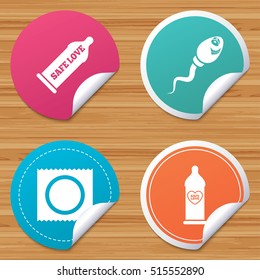 Round stickers or website banners. Safe sex love icons. Condom in package symbol. Sperm sign. Fertilization or insemination. Heart symbol. Circle badges with bended corner. Vector
