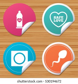 Round stickers or website banners. Safe sex love icons. Condom in package symbol. Sperm sign. Fertilization or insemination. Circle badges with bended corner. Vector