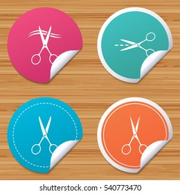 Round stickers or website banners. Scissors icons. Hairdresser or barbershop symbol. Scissors cut hair. Cut dash dotted line. Tailor symbol. Circle badges with bended corner. Vector