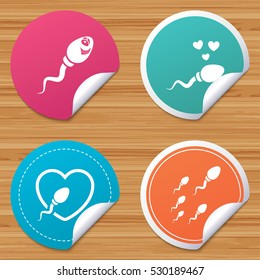 Round stickers or website banners. Sperm icons. Fertilization or insemination signs. Safe love heart symbol. Circle badges with bended corner. Vector