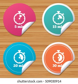 Round stickers or website banners. Timer icons. 5, 15, 20 and 30 minutes stopwatch symbols. Circle badges with bended corner. Vector