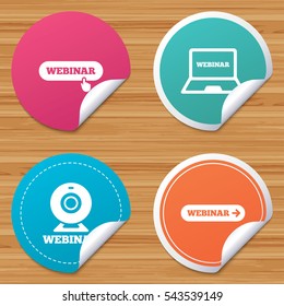 Round stickers or website banners. Webinar icons. Web camera and notebook pc signs. Website e-learning or online study symbols. Circle badges with bended corner. Vector