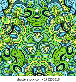 Round symmetrical pattern in green, blue and yellow colors. Mandala. Kaleidoscopic design.