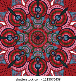 Round symmetrical pattern in red, blue and green colors. Mandala. Kaleidoscopic design. Cinco de mayo. Ethnic background.