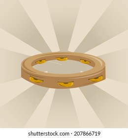 a round tambourine in a light brown background