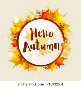 Round vector autumn banner with orange falling maple leaves. "Hello autumn" lettering.