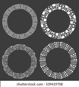 Round vector frames and wreaths made of different abstract elements drawn with black ink pen. Linear art resembling African motifs and patterns. For design of frames, headers, banners, greeting cards.