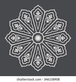 Round vector ornament with overlapping scrolls on dark background. Twelve  pointed circular pattern. Mandala. 
