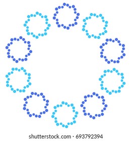 Round wreath of light blue and dark blue snowflakes on a white background.