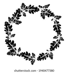 Round wreath of oak leaves. Frame made of oak leaves and branches. Ink print leaves. Black ink prints of leaves of trees and bushes on a white background. Isolated traced vector objects.