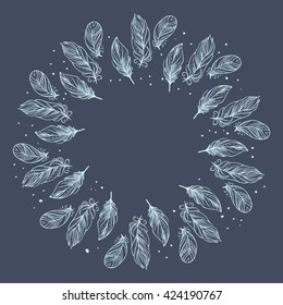 Round wreath with place for your text. Bird feathers on dark blue background. Vector hand drawn illustration