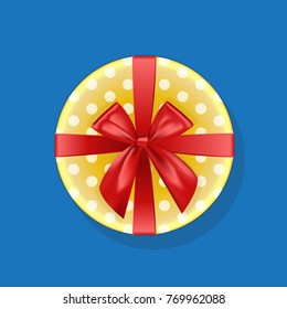 Round yellow dotted Gift box. Top view. Golden and red bow ribbons. Christmas, New Year, birthday, anniversary, holiday box.  Vector.