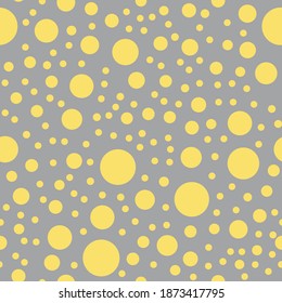 Formas redondeadas amarillas sobre fondo gris. Patrón simple abstracto sin inconvenientes. Colores del año 2021. Adecuado para envolver papel, textil.