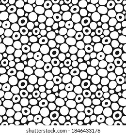 Rounded spots seamless pattern. Freehand pattern. Black and white abstract circles background. Vector illustration. Repeating spotty texture. Elegant ornament. Design textile, paper, wallpaper.