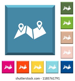 Route plan white icons on edged square buttons in various trendy colors