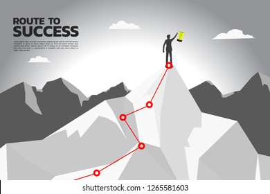 route to success. silhouette of businessman with champion trophy on the top of mountain. Concept of Goal, Mission, Vision, Success in Career path.