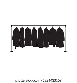 A row of coats hangs on a rack creating a stark black silhouette