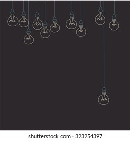 Row of unlit bulbs, one dangling lower