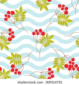 Rowanberry branch on blue waves seamless pattern. Vector winter holidays background.