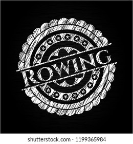Rowing chalk emblem written on a blackboard