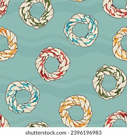 Rowing inspired vector seamless pattern. Old school oarlock ropes with a water background. 