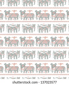 rows of ornate grey elephants on white background