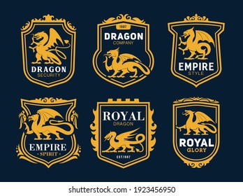 Royal heraldic icons with dragons, fairytale monsters. Coat of arms with golden dragons silhouettes, rearing winged mythological or fantasy animal. Company emblem in shield frame and ornate border