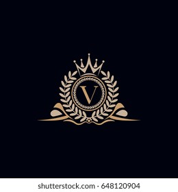 Royal logo design with letter V leafs and crown