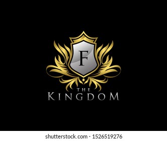 Royal Shield F Letter Logo. Golden Vintage Shield With F Letter and crown prefect for boutique, hotel, restaurant, wedding and other vintage business. 